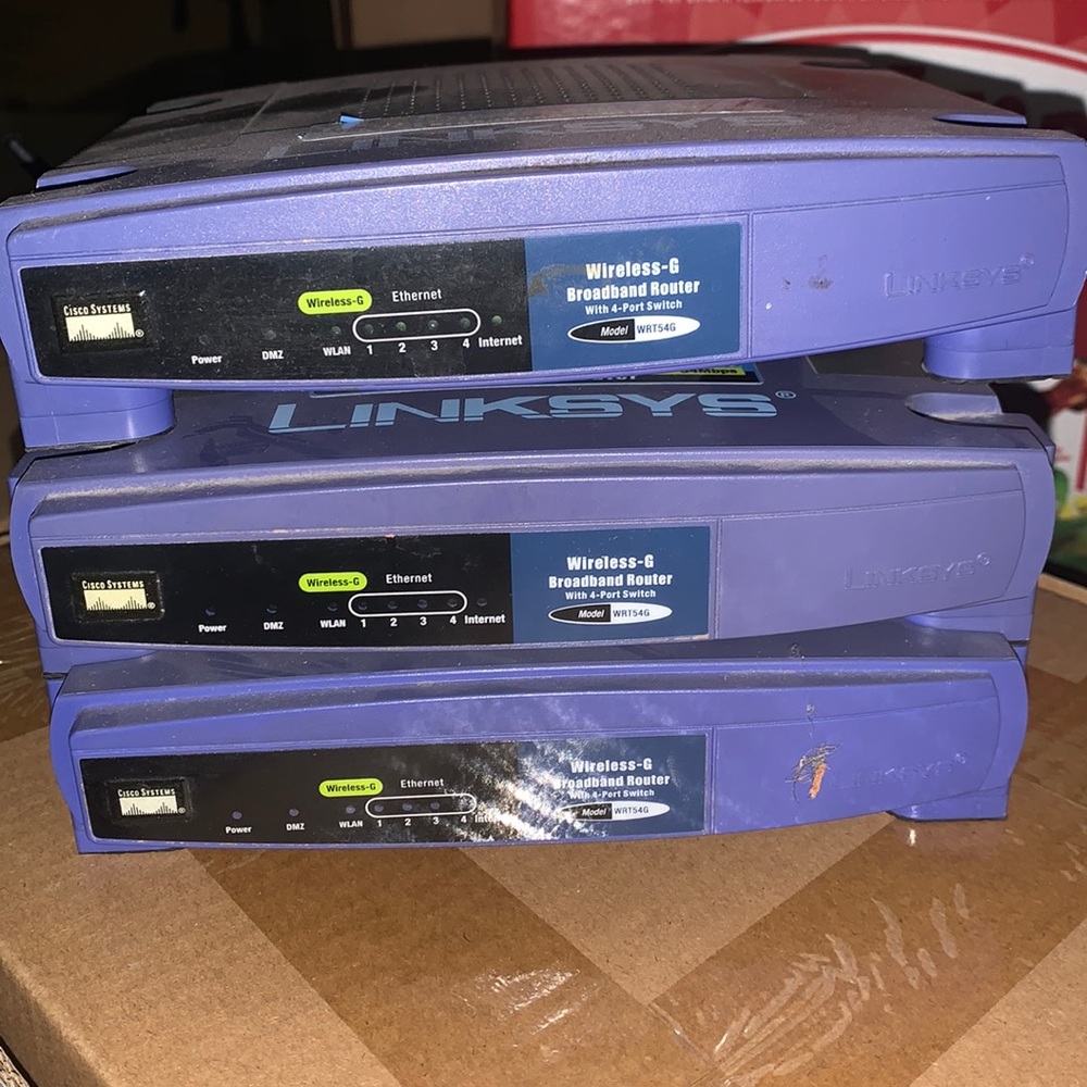 Three Linksys Wireless-G WRT 54g Version 3